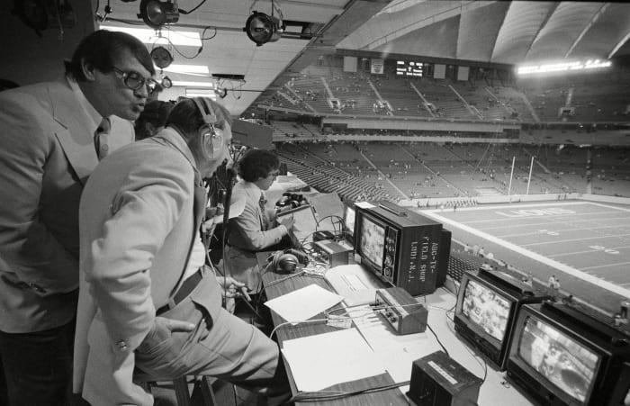 Cosell (center), with later MNF partners Alex Karras (left) and Frank Gifford, in 1975.